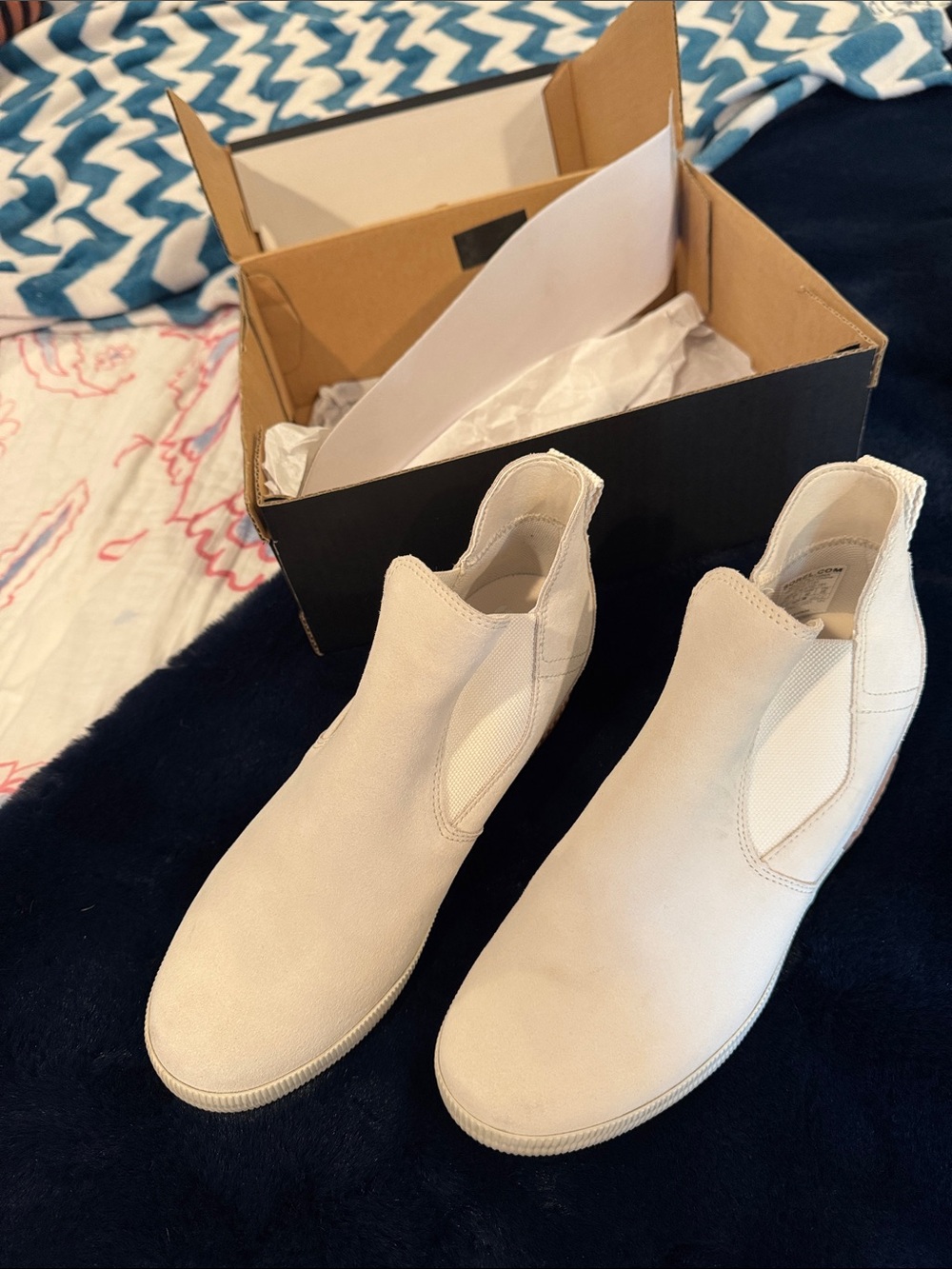 Sorel Cream Slip-On Ankle Booties